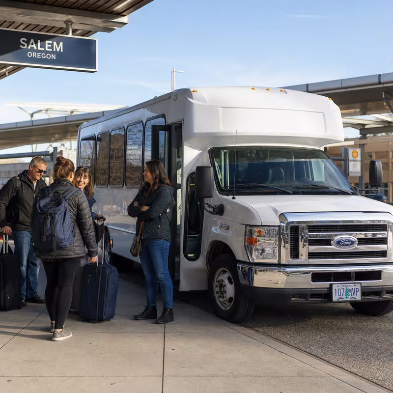 Black Mercedes Sprinter van staged for an Salem Airport Transportation group