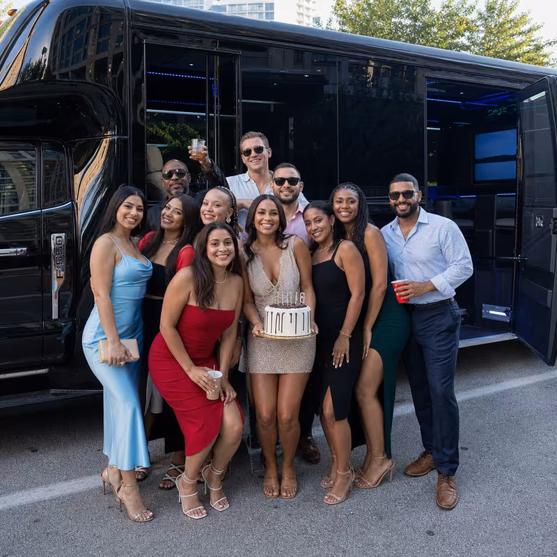 Group boarding a white charter bus for Birthday Transportation transportation in Salem