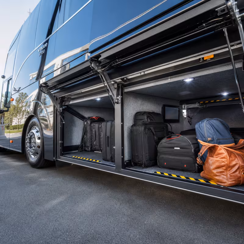Party bus interior with wraparound leather seating and LED lighting in Salem