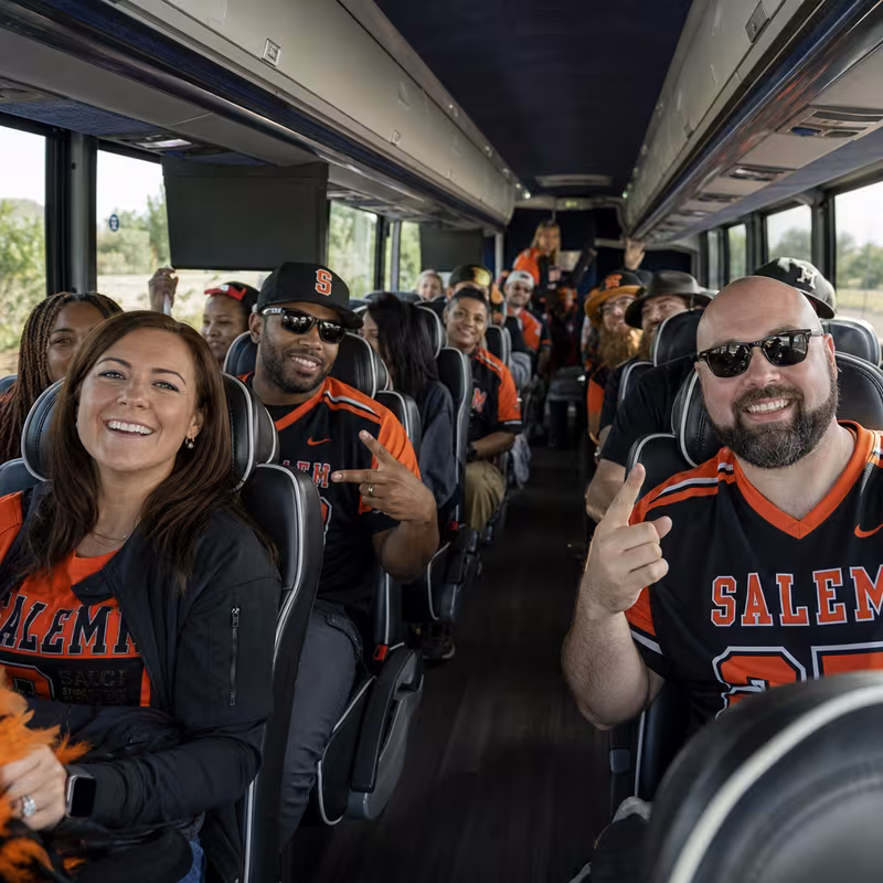 Black Mercedes Sprinter van staged for an Salem Sporting Event Transportation group