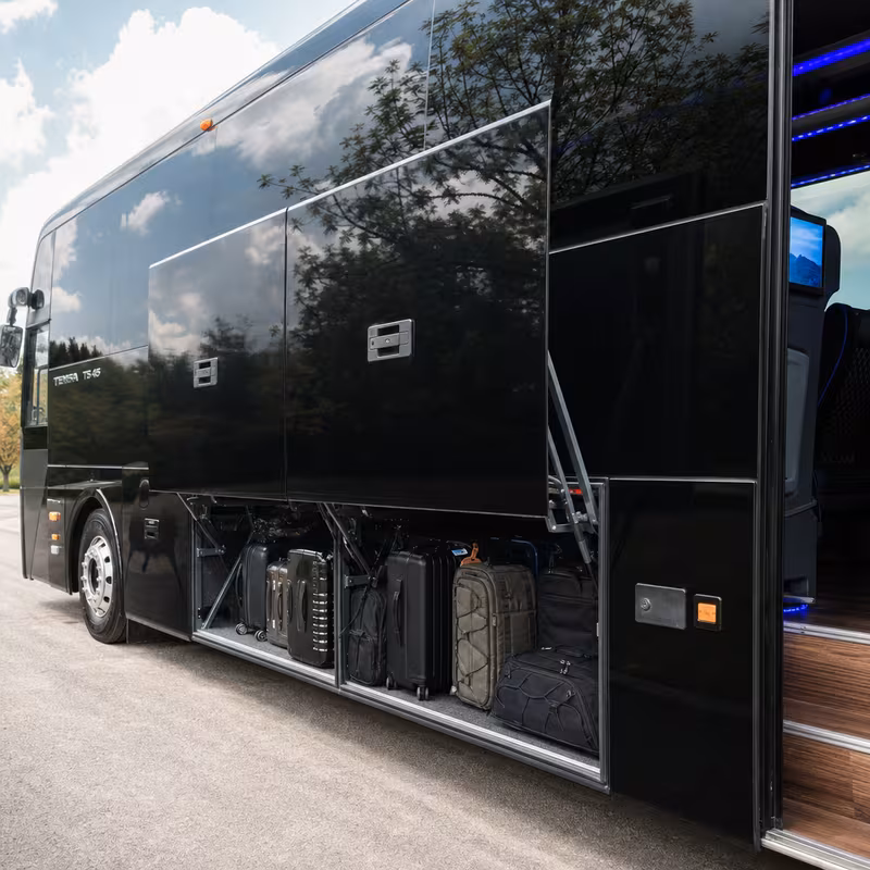 Party bus interior with wraparound leather seating and LED lighting in Salem
