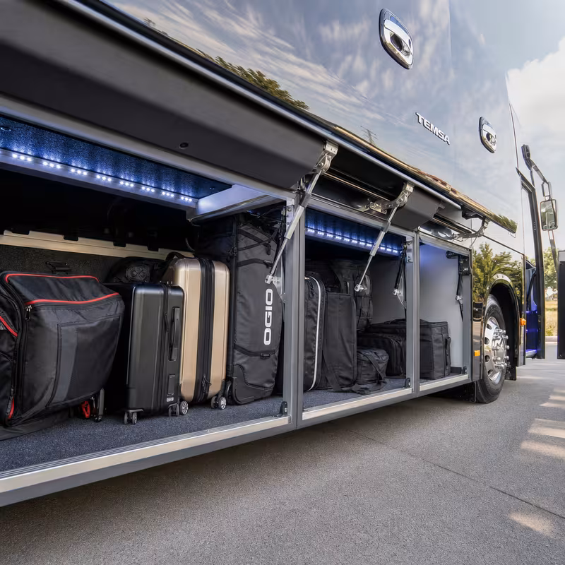 Party bus interior with wraparound leather seating and LED lighting in Salem
